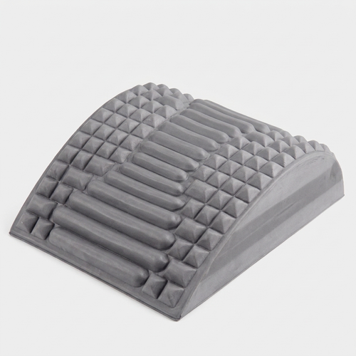 Crown Spinal Decompression Stretcher, a contoured grey arch with ridged and nubbed support surface